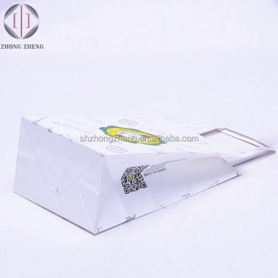 China Recyclable Wholesale Price Customized Famous Brand Food Kraft Wrapping Paper Bag With Handles for sale