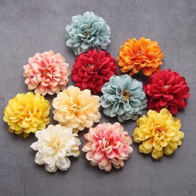 China Factory Wholesale 50pcs/pack 7CM Peony Camellia Flower DIY Artificial Flower Head Eco-friendly Silk Decorative Flower Head for sale