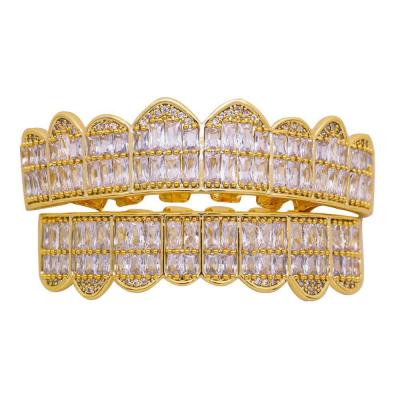 China Brass Micro Paved Iced Out CZ Gold Teeth Grills Set Design For Men for sale