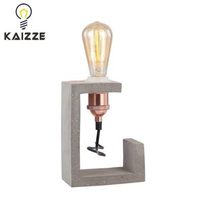 China Industrial Modern Simple Concrete Creative Table Lamp Personality Table Lamp Reading Rack Lamp for sale