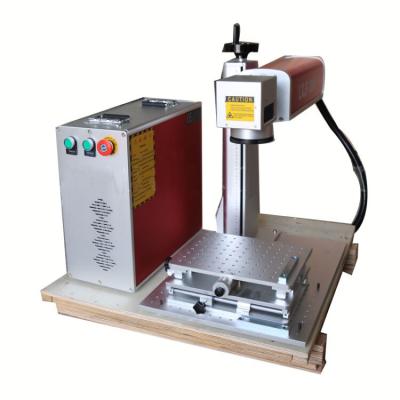 China Laser marking 20w 30w 50w 100w metal and non metal fiber laser marking machine for sale