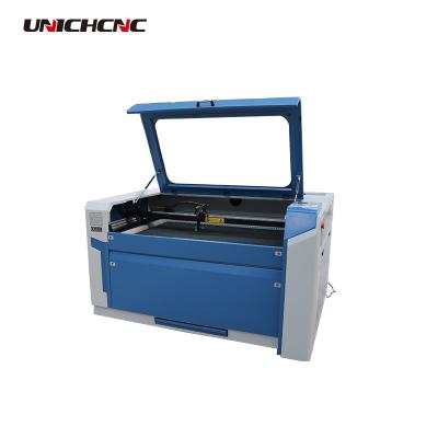 China Laser Engraving Jinan CNC CO2 Glass/Stone/Leather Laser Cutter Machine Price for sale