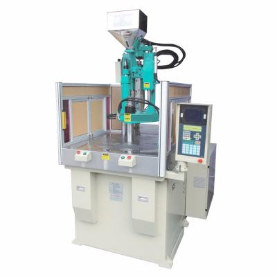 China VERTICAL Rotary Table 25T Vertical Suction Bath Handle Injection Molding Machine Price HM0089-22 for sale