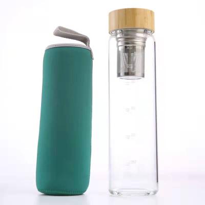 China Large Capacity Custom Logo Sports Durable Bamboo Lid Borosilicate Glass Heat Resistant Water Bottle for sale