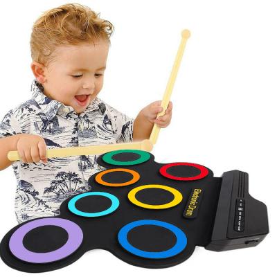 China Small Digital Silicone+ABS Hand Roll Up Christmas Gift Set Radio Control Toys Toy Drum Electric Drum Pad Drums for sale