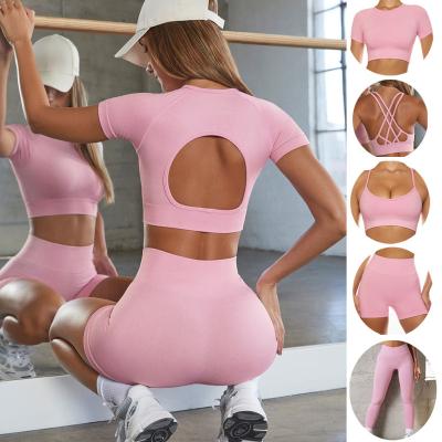 China Sexy Seamless High Waisted Short Sleeve Gym Workout Yoga Sets 5 Piece Breathable Sporty Ribbed Cavity Sportswear Sets For Women for sale