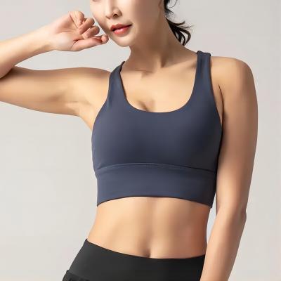 China Custom Made High Quality Yoga Cross Bra Women Fitness Sports Tank Tops White Gym Breathable Private Label Backless Bra for sale