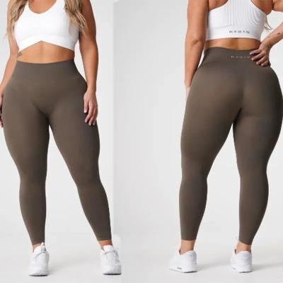 China Breathable Customizable High Waist Yoga Pants Solid Color Training Pants Seamless Women Yoga Leggings Plus Size Sports Yoga Leggings for sale