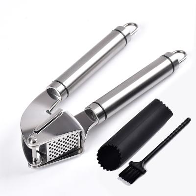 China Durable Tools Amazon 304 Stainless Steel Garlic Press Clamps Garlic Paste Clamps Mash Garlic Squeezer Kitchen Tools for sale