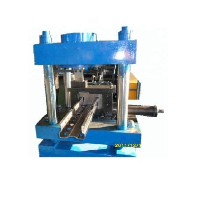 China Construction worksÂ   Manufacturer of Straight Pallet Storage Rack Roll Forming Machine in China for sale