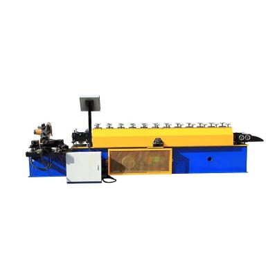 China Speed ​​Metal Strip Shutter Door Slat Roll Forming Machine In China for sale