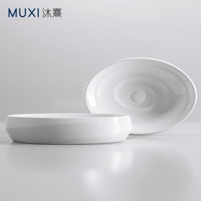 China New Snail Modern Special Design White Color Art Basin Counter Top Ceramic Art Basin Single Basin for sale