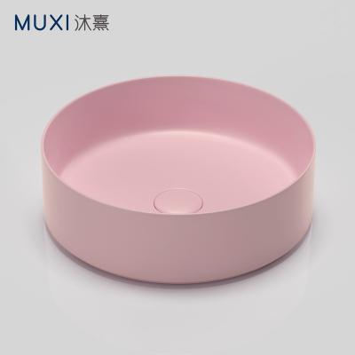 China Matt Pink Color Hand Wash Basin Modern Round Countertop Ceramic Sink Matt Pink Art Basin Bathroom Sink For Hotel for sale