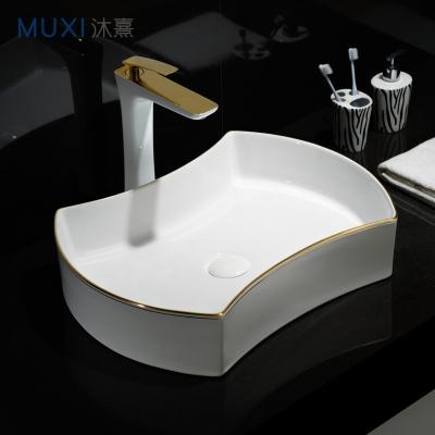 China Luxury Line Luxury Ceramic Bathroom Art Basin For Hotel Gold Wash Basin Counter Top White Gold Sink Ware Bathroom Sanitaryware for sale