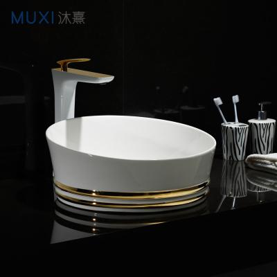 China Luxury Round Lavabo Lavabo Luxury Round Bathroom Basin Gold Color Ceramic Vessel Sink For Hotel for sale