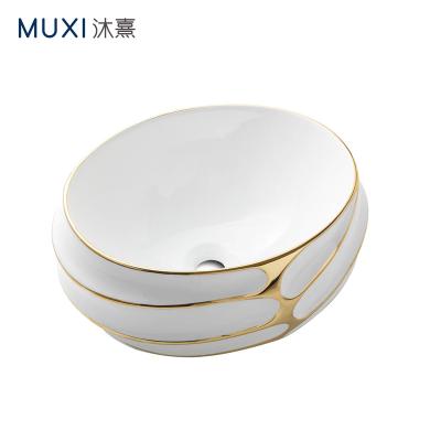 China Special Design Luxury Luxury Round Ceramic Sink Countertop Basin Color Gold Line Wash Basin For Bathroom for sale