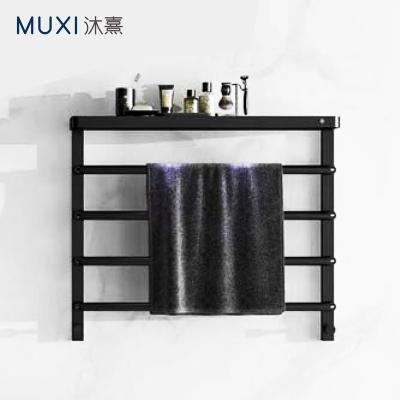 China Heater Hot Sale Matt Black Electric Heated Towel Rail Towel Warmer Stretch Electric Heated Wall Mounted Rack For Hotel Bathroom for sale