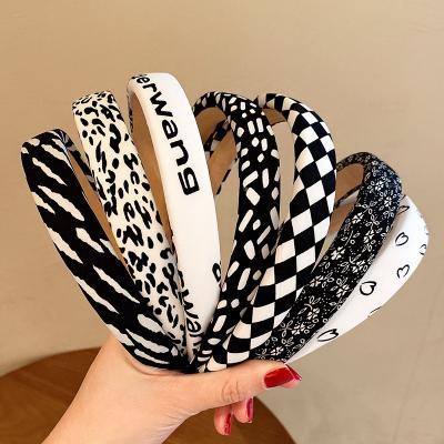 China Comfortable Retro New Leopard Print Cow French Wide Brimmed Headband Wash Simple Air Headband for sale