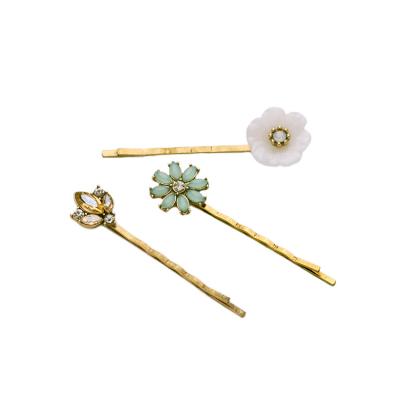 China Fashion Woman Hair Pins Girls Gold Resin Flower Hair Pins Fancy Hair Accessory Retro Mint Green Gemstone Sunflower Clip For Woman for sale