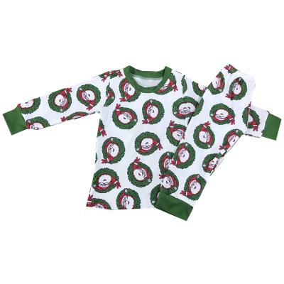 China Polyester / Cotton 2021 No MOQ Babies Printed Santa Claus And Kids Pajamas Fall Boutique Pajamas for sale