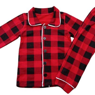 China Polyester/Cotton Christmas Clothes Santa Family Black And Red Stripe Plaid Wholesale Kids Christmas Pajamas for sale