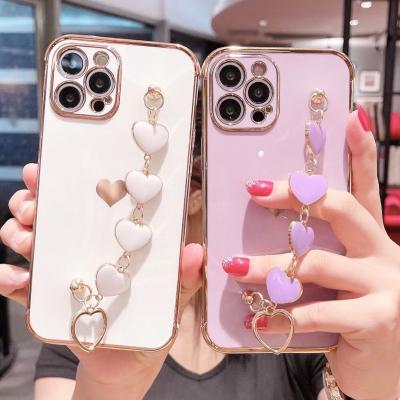 China Free Shipping Anti-drop Love Heart Mobile Cover For iPhone 11 Pro Max Mini X XR XS 7 Max Case 12 8 Plus Wristband Strap Cell Phone Case for sale