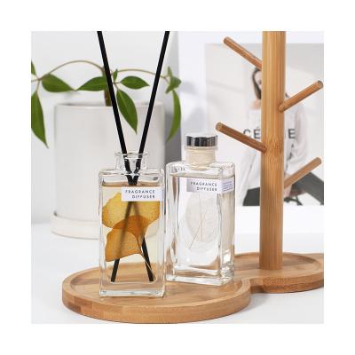 China Home Office Hotel Bedroom.etc Smell Removal 100ML Clear Glass Reed Diffuser With Dried Flower For Home for sale