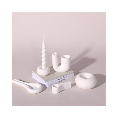 China Central Statistical Modern Minimalist Style White Scandinavian Candlestick Decorative Art Shaped Ceramic Holder for sale