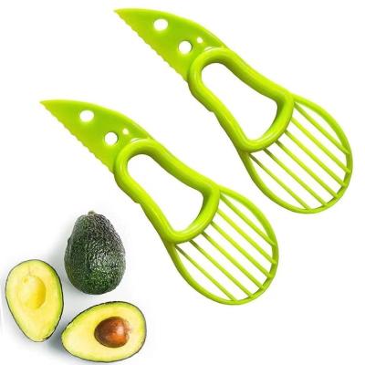 China Professional Avocado Slicer Tool 3-in-1 Stocked Multifunctional Avocado Peeler Cutter for sale