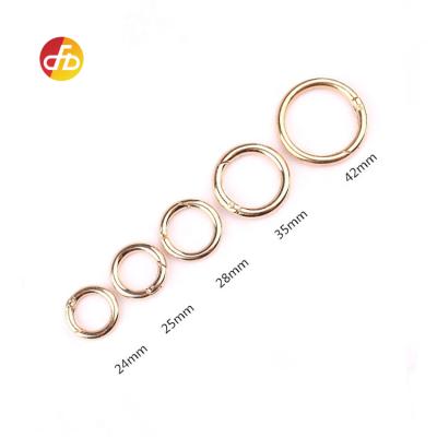 China Bags Polished Diameter 25mm Pink Gold O-ring Spring Carabiner Open Ring Inner Metal Ring for sale