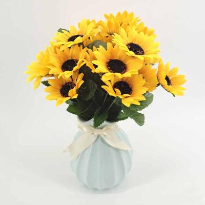 China Home Decoration Fabric / Plastic Artificial Flower 7 Heads Sunflower Bouquet Wedding Decoration for sale