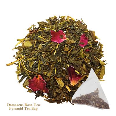 China Ice Tea Triangle Tea Pyramid Bag Nylon Pyramid Tea Bag Packing Damascus Rose Green Tea for sale