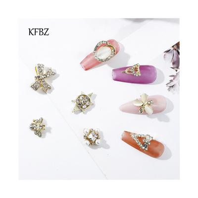 China Hot Selling Luxury Nail Art Zircon Glamor Luxury Alloy Designer Nail Art Zircon Gold Silver Metallic 3d Amazon Nail for sale