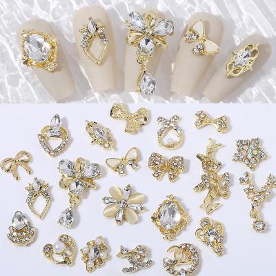 China Zircon Pendant Diamond Nail Art Jewelry Bear Charm Art Decoration Wholesale Bulk Gorgeous Rhinestone Gold Bow Nail for sale