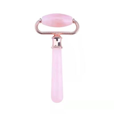 China Hot Selling Natural Pink Face Rose Quartz Jade Face Roller for sale