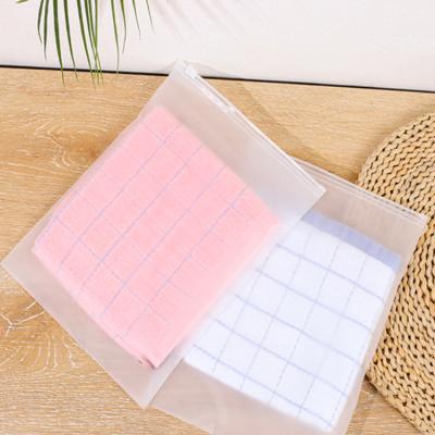 China Moisture Proof Custom Print Frosted Plastic Packaging Bag for Towel and Toiletries Matte Semi-transparent Pouches with Zipper for sale