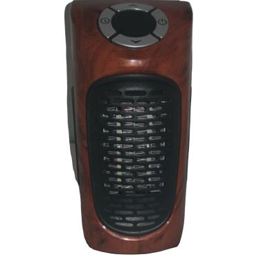 China Household 350W Mini Electric Plug In Heater PTC Heater With Stand Water Transfer Printing Wood Finish for sale