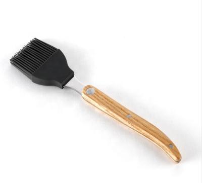 China Hot Selling Easily Cleaned Kitchen Multifunctional French Silicone Handle Oil BBQ Wooden Brush for sale