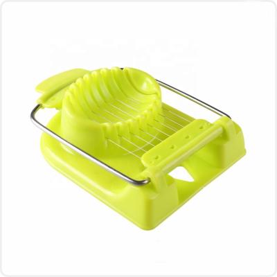 China Sustainable Food Grade Kitchen Manual Cooking Tools Stainless Steel Plastic Egg Slicer Cutter for sale