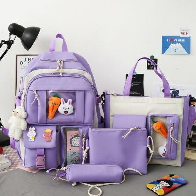 China Hot Selling Daily School Bags Backpack 4 in 1 Kids Multi Pockets Pencil Pouch School Bags with Toys and Pendants for sale