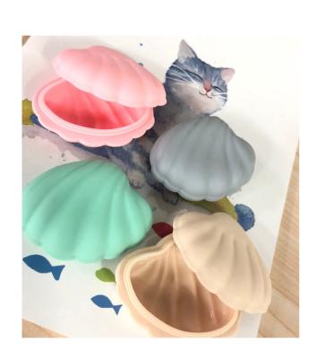 China Factory Price Soft Shell Shape Macarons Silicone Travel Jewelry Medicine Storage Container Case for sale