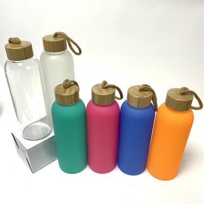 China New style rts stocked 20oz 25oz mixed walmart style sublimation glass colored frosted bottle white with bamboo lid for sale