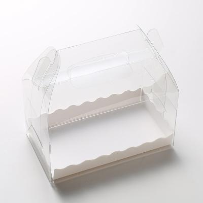 China Hot Sale Portable Transparent PVC Cake Roll Packaging Swiss Towel Roll Pastry Plastic Box With Tray for sale