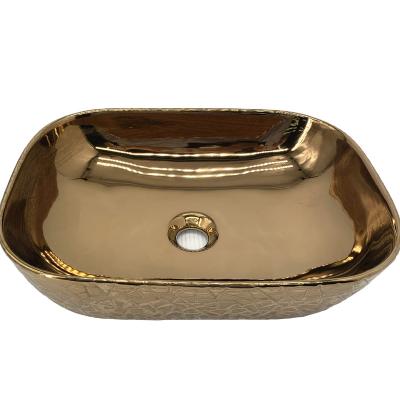 China Modern Luxury Glossy Electroplating Gold Color Ceramic Sanitary Ware Art Basin Hotel&Home Table Top Basin for sale