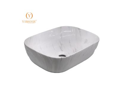 China Modern Rectangular Shape Ceramic White Luxury Marble Sink Modern Sanitary Ware Art Basin Ceramic Sanitary Ware Art Basin for sale