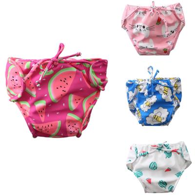 China Antibacterial Babies Boys Toddler Swim Diaper Reusable Cartoon Printed Baby Swimwear Pants Strings Swimming Pants For Baby for sale