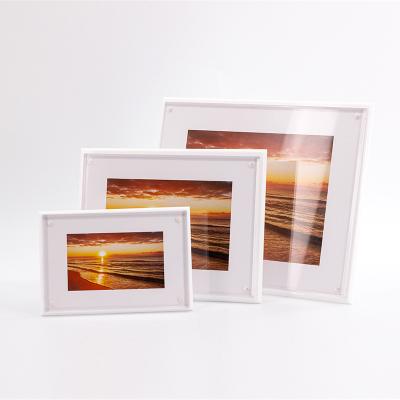 China Eco-friendly New Style Acrylic Photo Picture Frame With Stand for sale