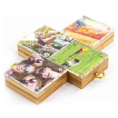 China Environmentally Friendly Ingenious Acrylic Photo Picture Frame With Adhesive For Wedding Hanging On Christmas Tree for sale