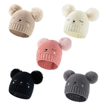 China COMMON Casual Winter Baby Boy Little Girl Hats And Hat Toddler Wool Knit Beanie With Smile Face Embroidery for sale