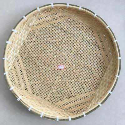 China Sustainable Weaving Flat Bamboo Strainer Basket Handmade Bamboo Basket for sale